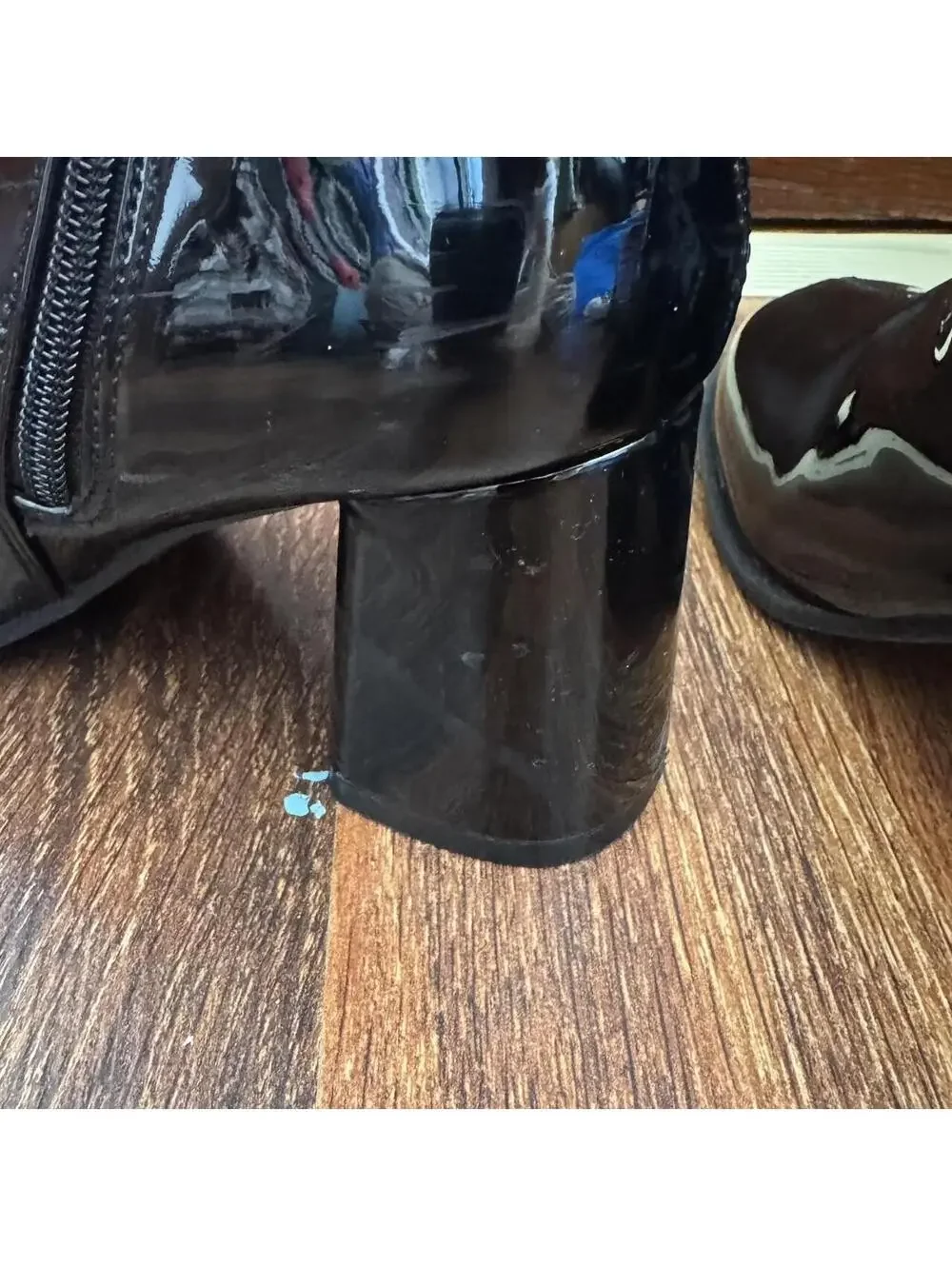 Black knee-high/go go boots with a 4” heel